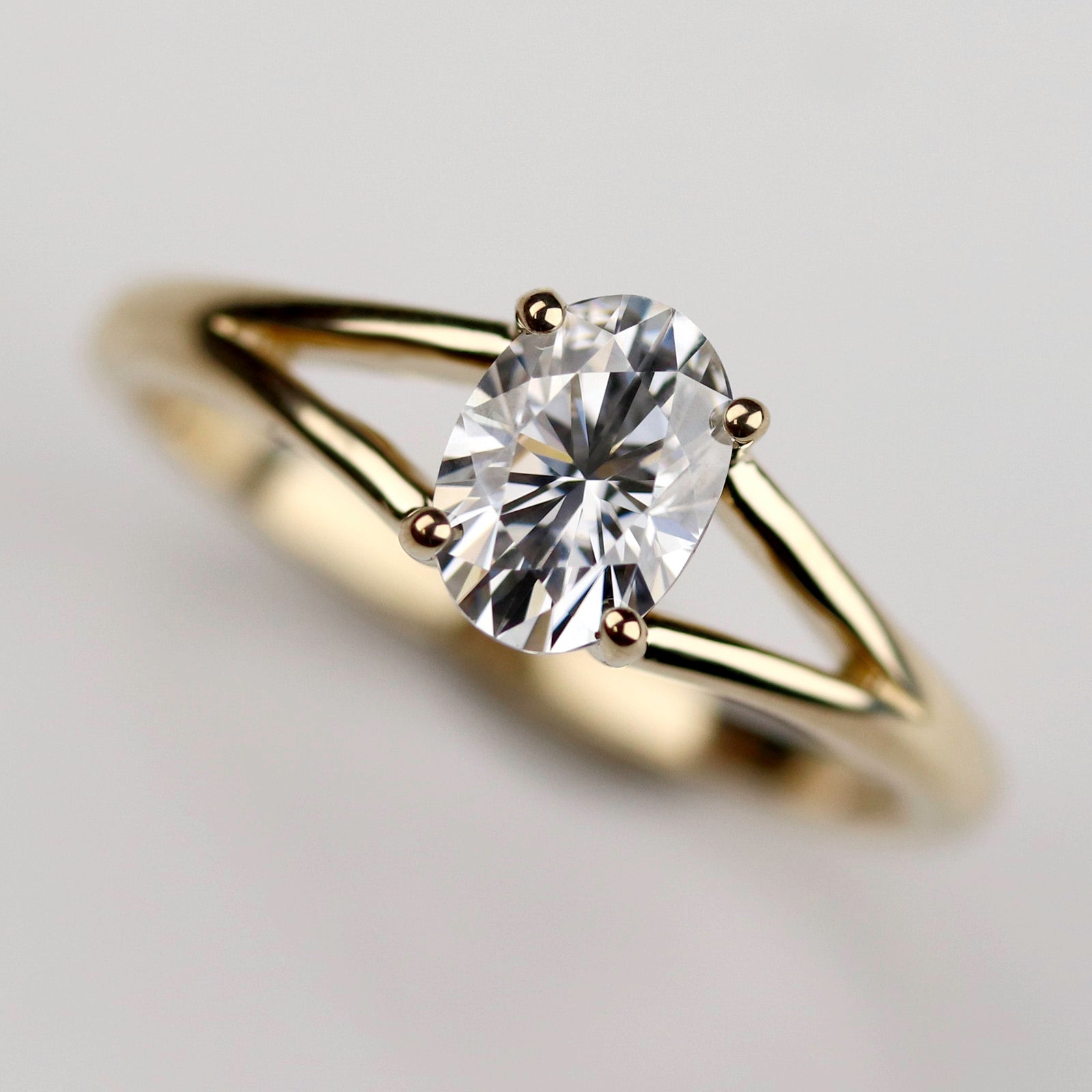 Oval-cut Split Shank Solitaire Engagement Ring